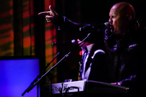 Mike Score, lead singer of English new wave and synthpop band A Flock of Seagulls, performing live at Mizner Park Amphitheater in Boca Raton, Florida as a part of the Legends of the Old School concert.