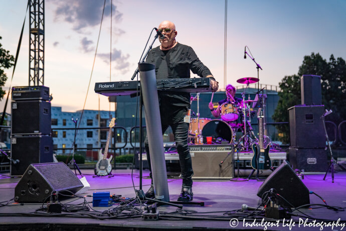 A Flock of Seagulls frontman and keyboard player Mike Score and drummer Kevin Rankin performing at Sunset Music Fest on the Town Center Plaza in Leawood, KS on June 27, 2019.
